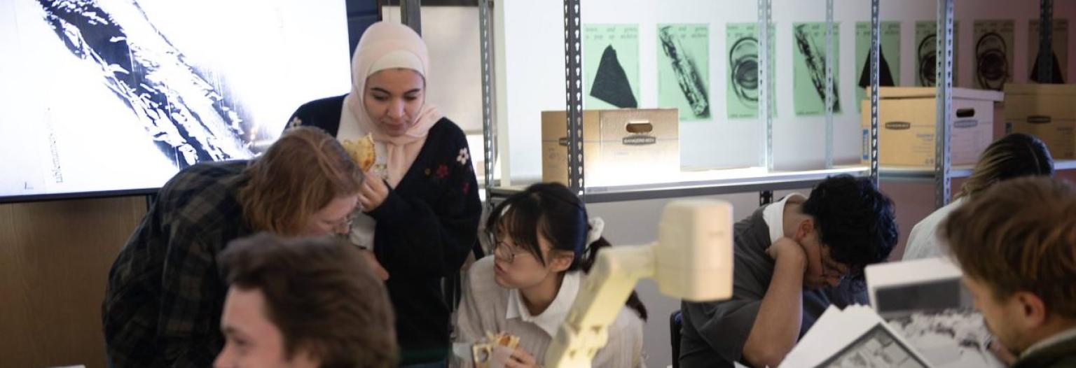 A group of architecture students collaborate