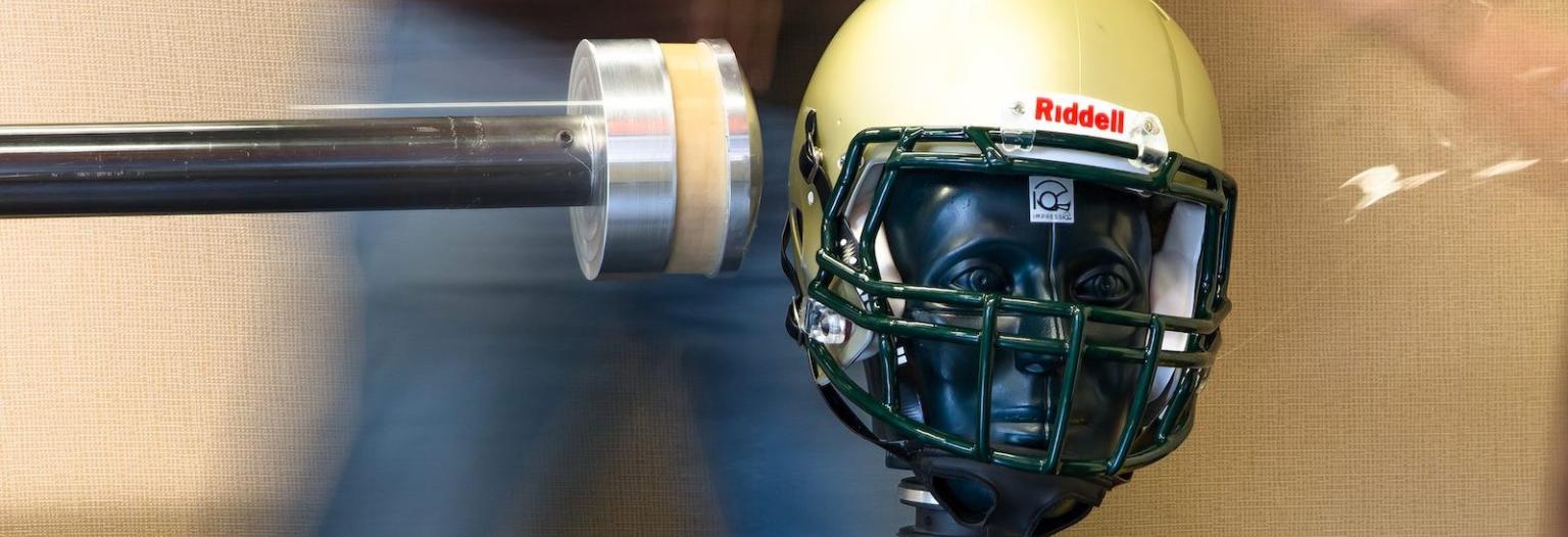 A machine tests a football helmet