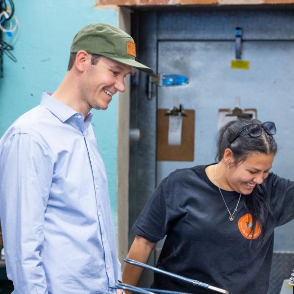 Matias Gutneckt in the kitchen of his restaurant, Taco Uprising, with an employee